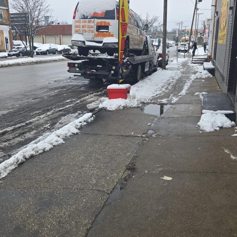 Emely's Tire Service tow truck ready for roadside assistance