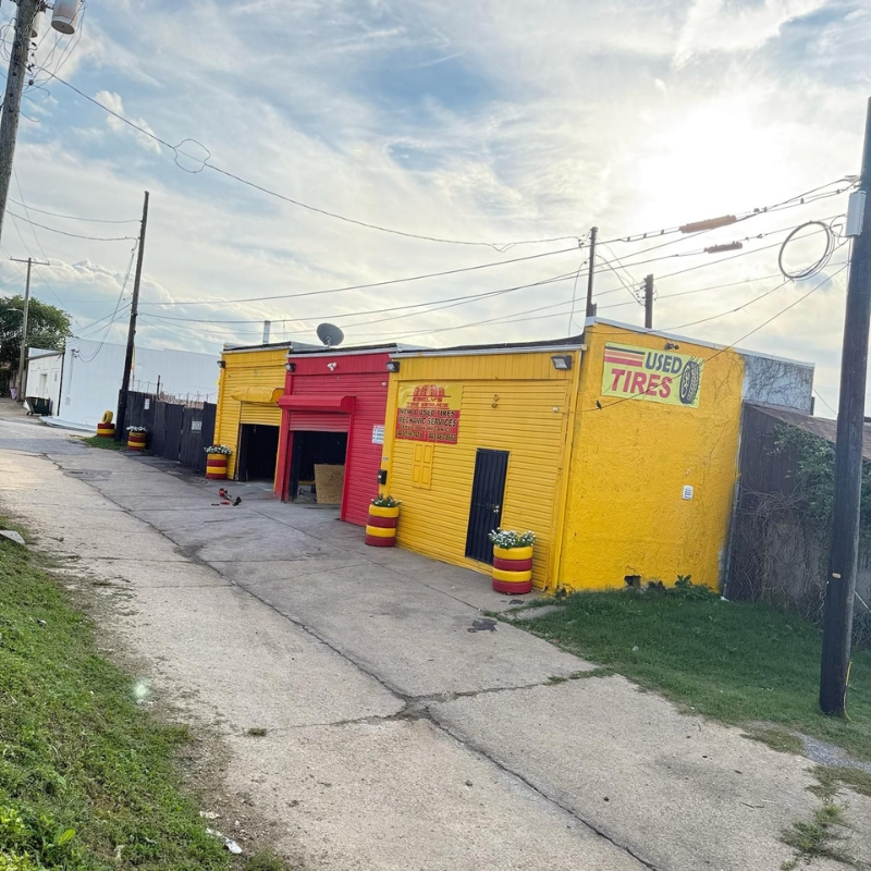 Hanover St shop exterior featuring Used Tires sign